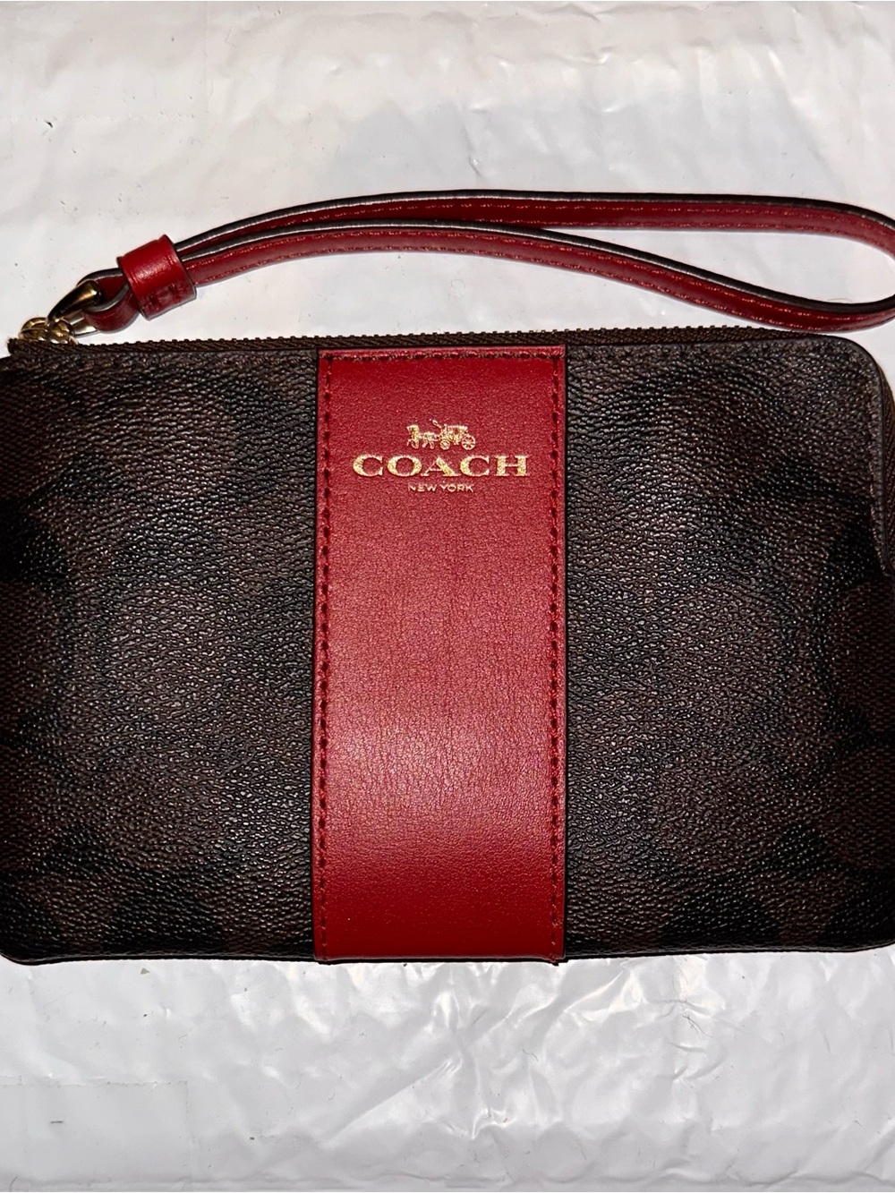NWOT Coach Brown Signature Wristlet with Red Center Stripe